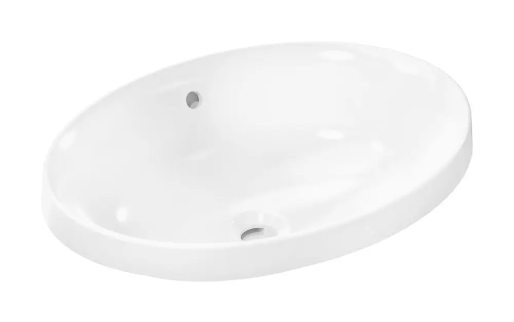 Ein ovaler, weißer Einbauwaschtisch von Hansgrohe, ohne Hahnloch, mit einem Überlauf. Die glatte Oberfläche zeigt keine sichtbaren Fugen oder Beschädigungen.